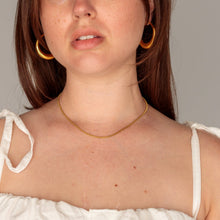 Load image into Gallery viewer, Woman wearing a white top with thin straps against a plain background
